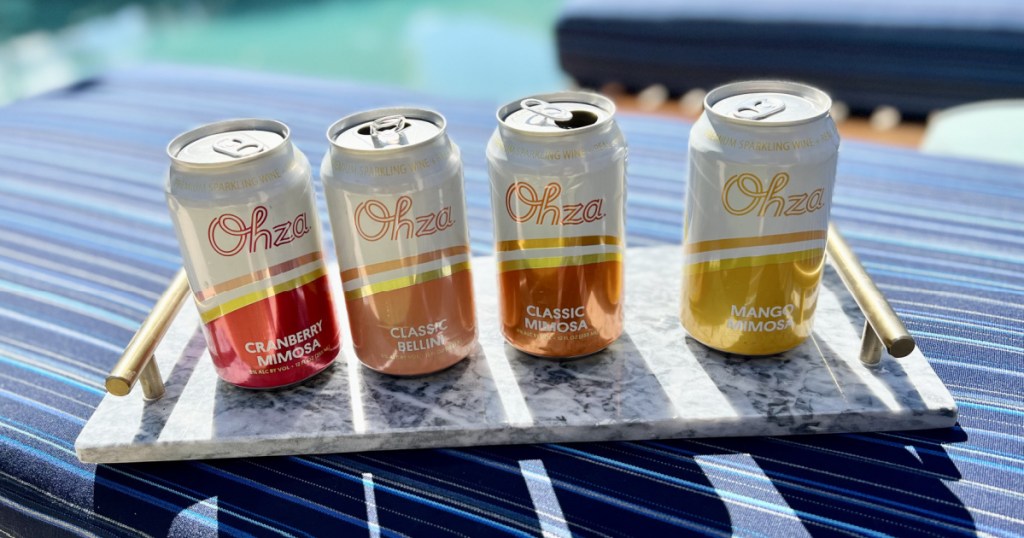 12 canned mimosas by the pool