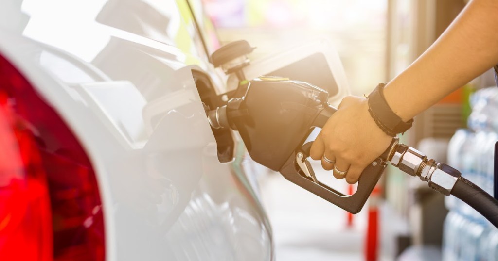 hand pumping gas