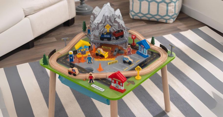 KidKraft Rocky Mountain Wooden Train Set & Table w/ 50 Accessories in playroom