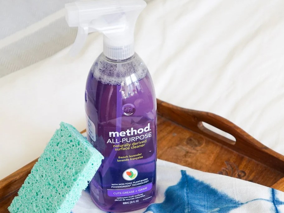 Method All-Purpose Cleaner Spray bottle on a wood tray with a sponge