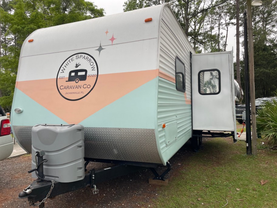 white, peach, and green rv 