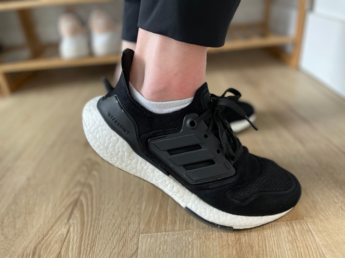 woman wearing Adidas Ultraboost running shoes for women