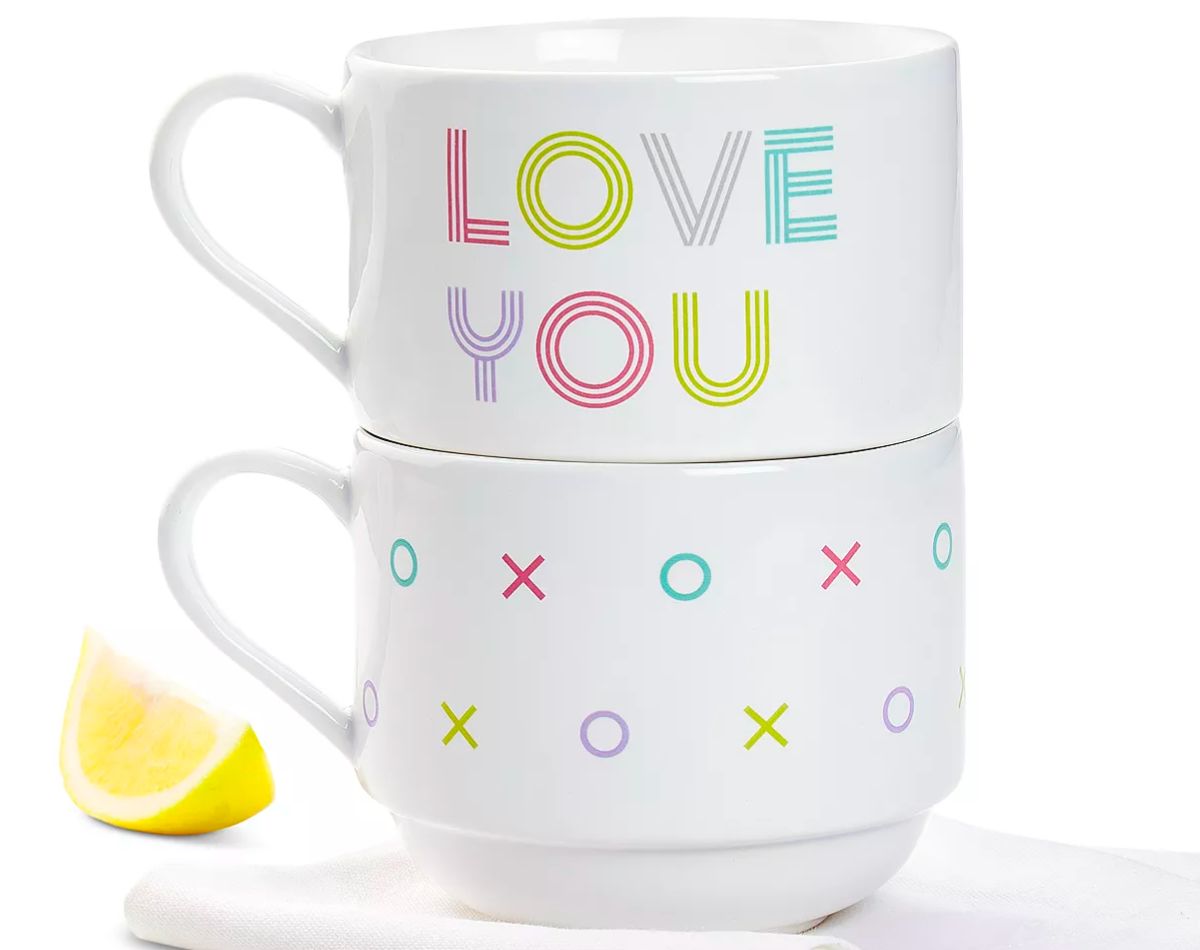 a 2-Piece set of Stackable Stoneware Mug with XO's and Love you printed on them in pastel colors