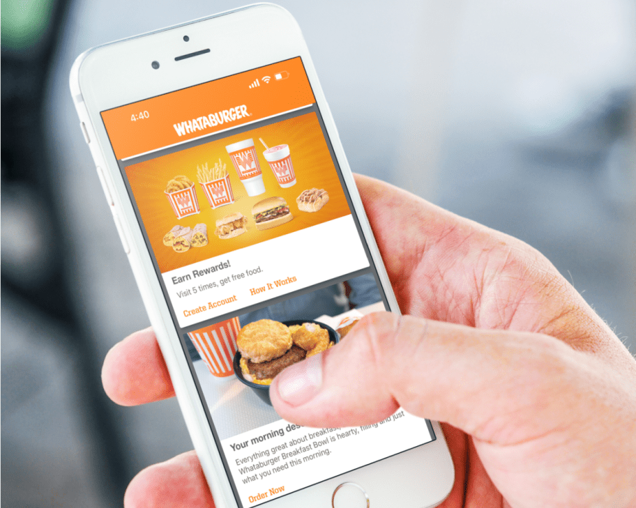 hand using the Whataburger App