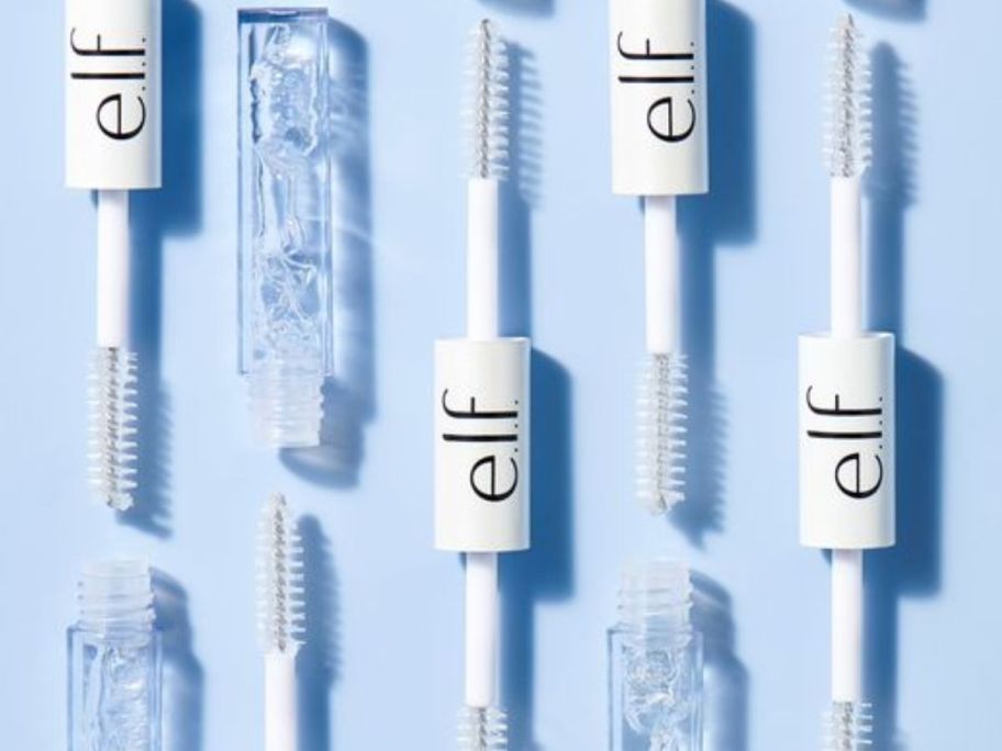 elf lash mascara and brow gel on blue background