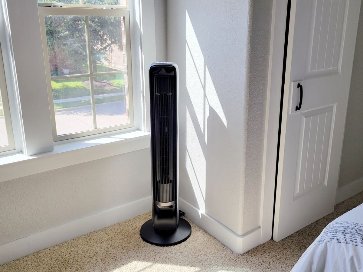 tower fan by window in house