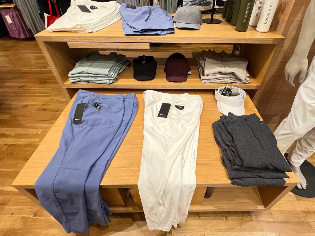 wood display table with men's pants