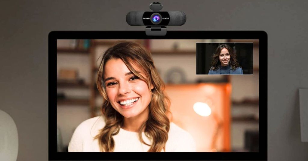Computer with eMeet webcam attached to the top of the screen