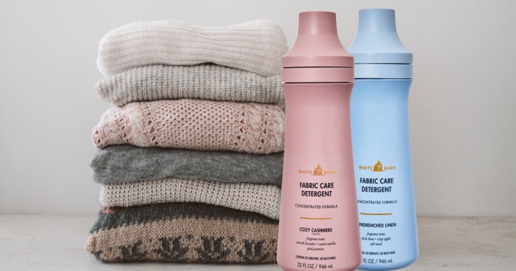 Bath & Body works Laundry Detergent Next to a Stack of folded clothes