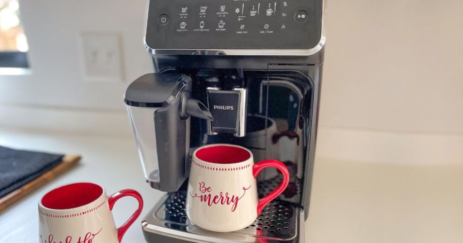 Philips 3200 Series Fully Automatic Espresso Machine LatteGo Milk Frother on a kitchen counter brewing a mug of coffee