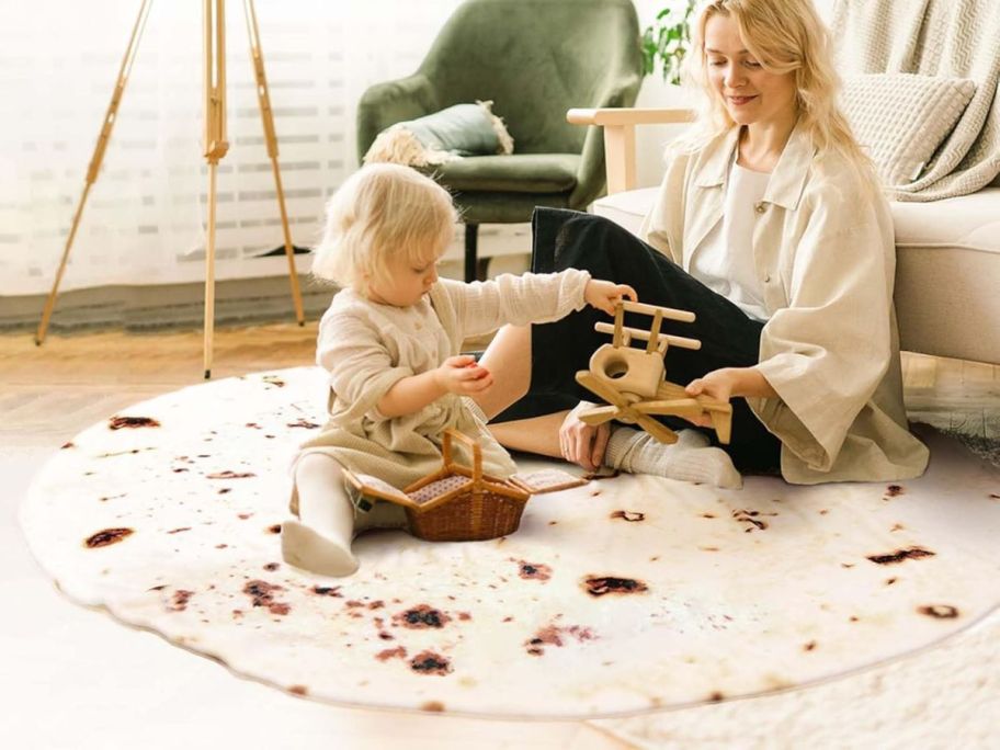 two people sitting on tortilla blanket