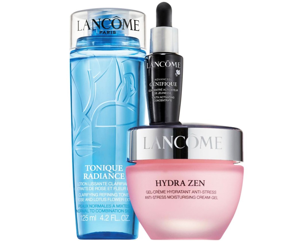 blue bottle of toner, pink face cream, and small black bottle of facial serum