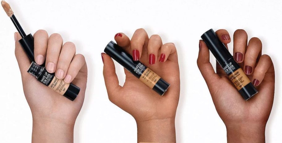 3 hands holding Make Up For Ever Matte Velvet Skin High Coverage Concealer