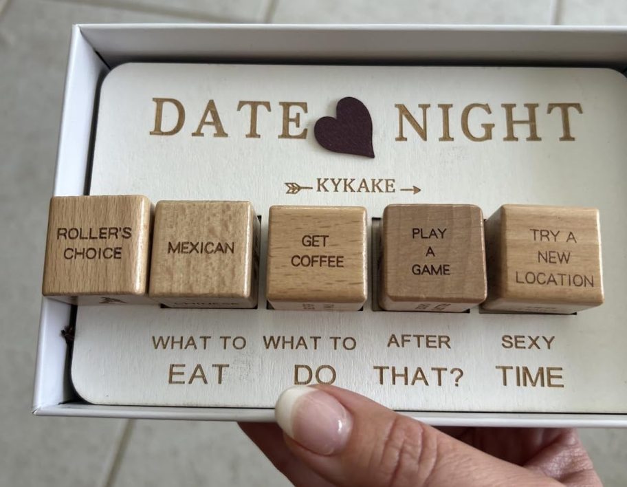 hand holding date night dice game