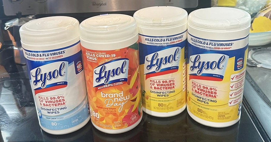 4 containers of lysol wipes on kitchen stove