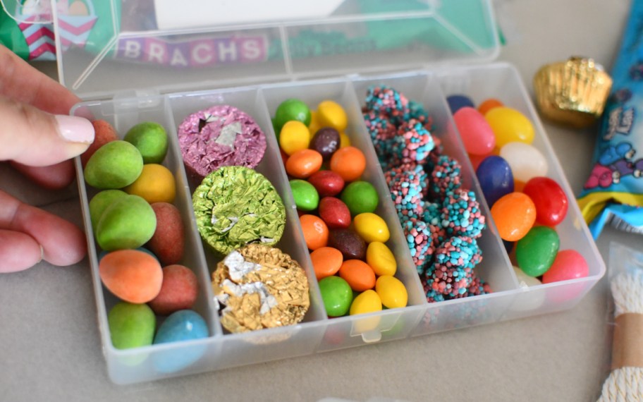 snackle box with rainbow M&Ms, skittles, reese's, nerds gummies, and jelly beans