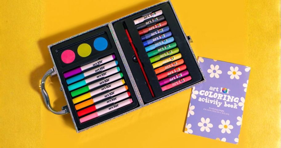 27 piece art set against yellow background