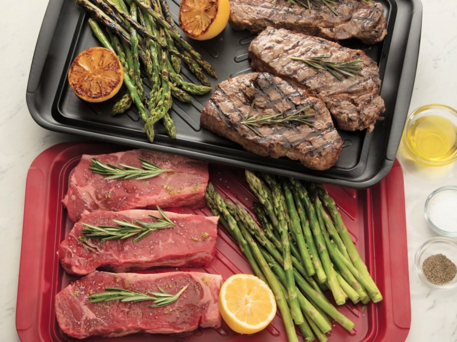 cuisinart grill trays full of raw and cooked steak, asparagus, and lemon