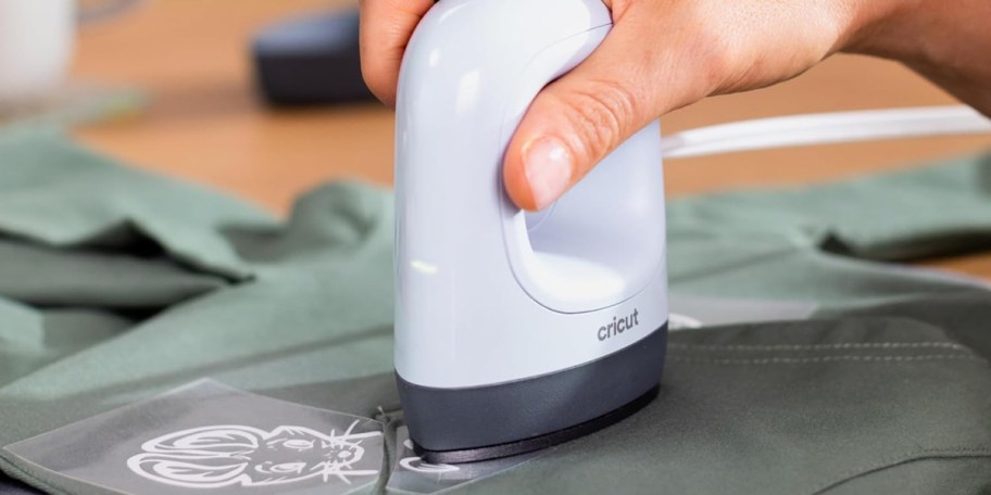 hand using cricut easy press 