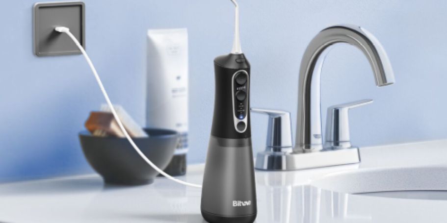 Cordless Water Flosser JUST $7.99 on Amazon | Includes 6 Replacement Heads & Tongue Scraper