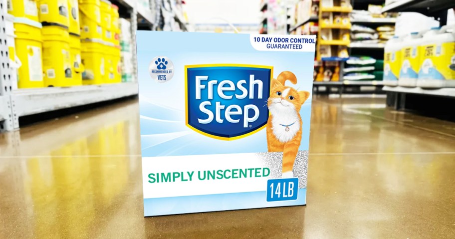 box of Fresh Step Unscented Cat Litter on floor of pet store