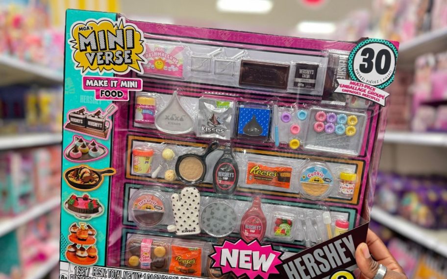 hand holding MGA's Miniverse Make It Mini Hershey's Multipack box in store