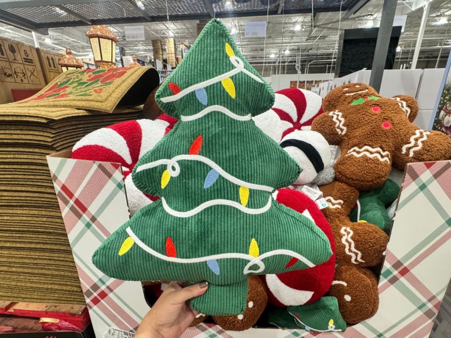 Christmas Tree Pillow in hand in store