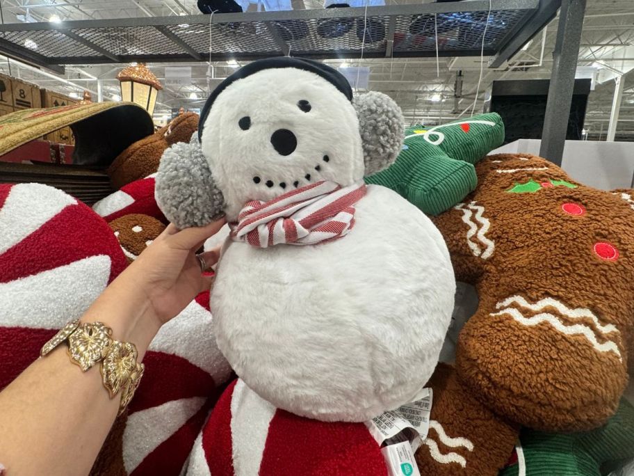 Snowman Pillow in hand in store