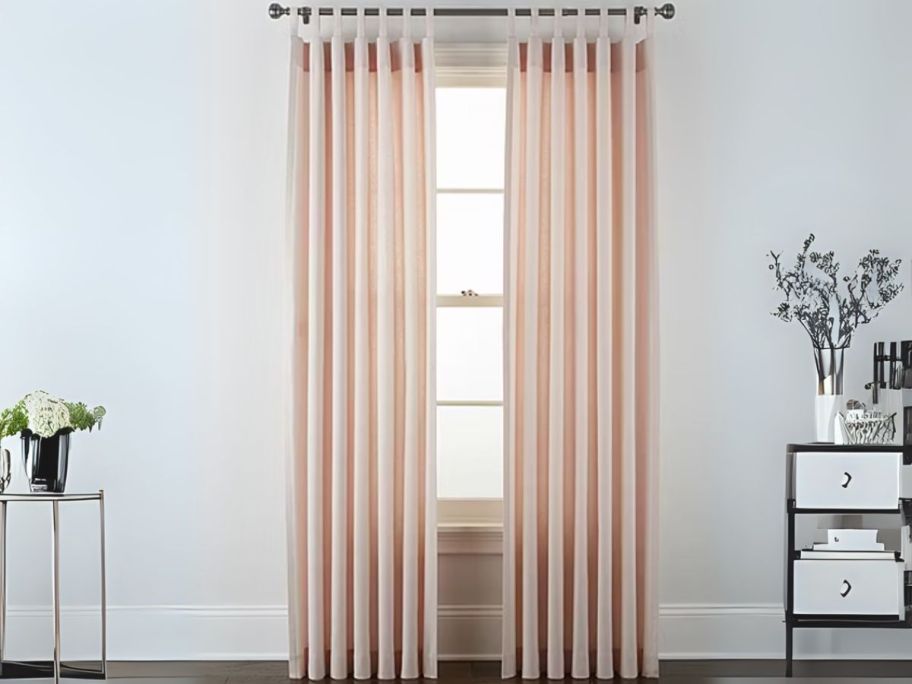 pink curtain on window