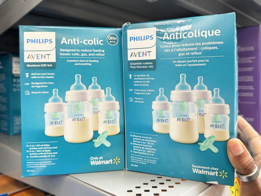 two blue boxes of Philips Avent Anti-Colic Baby Bottle Newborn Gift Sets on store shelf