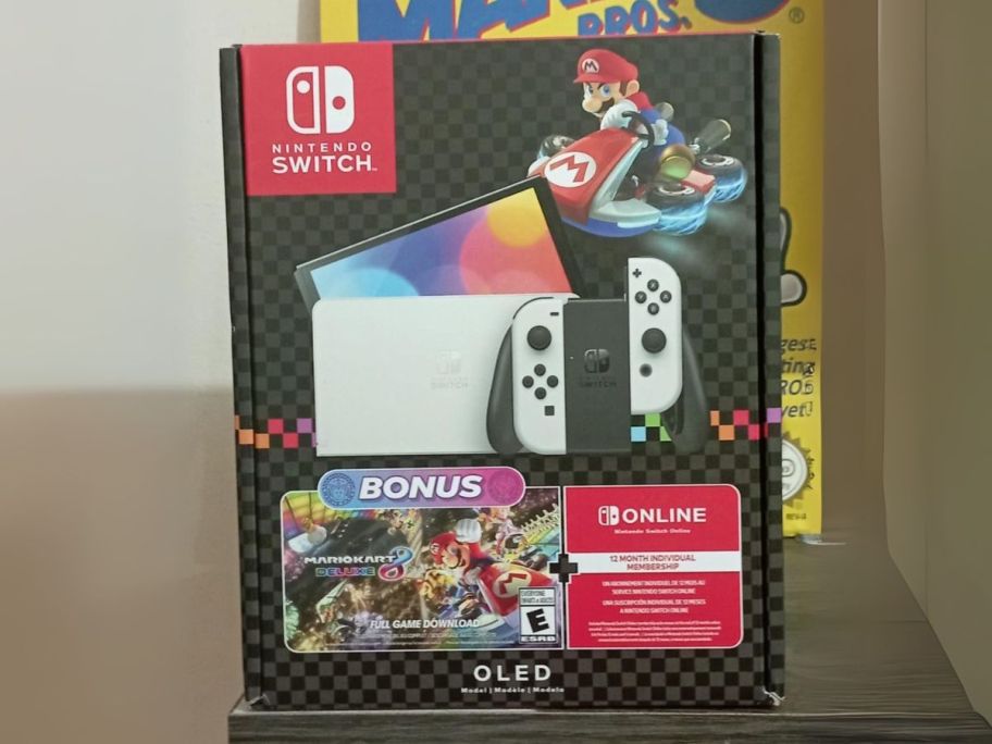 Nintendo Switch OLED Mario Kart 8 Deluxe Bundle box on table