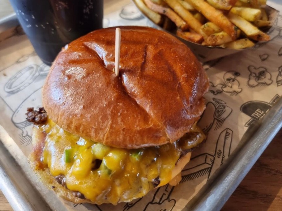 cheeseburger with toothpick through the bun