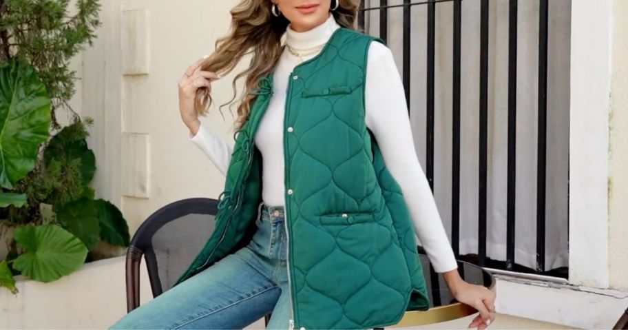 Woman wearing a green Ecowish quilted puffer vest