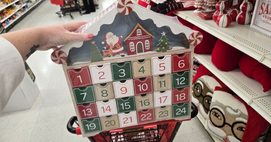 Christmas Advent calendar in the shape of a wooden house