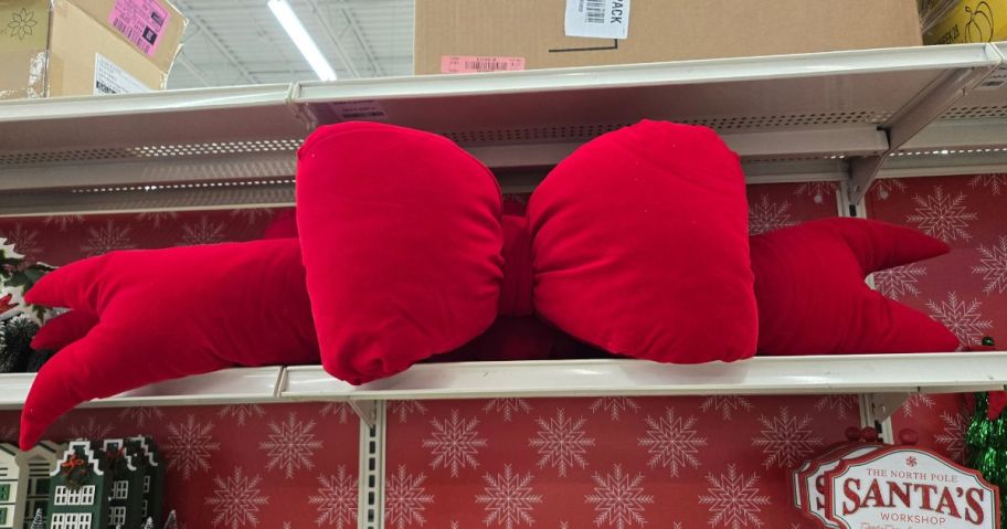 A large plush Christmas bow decoration