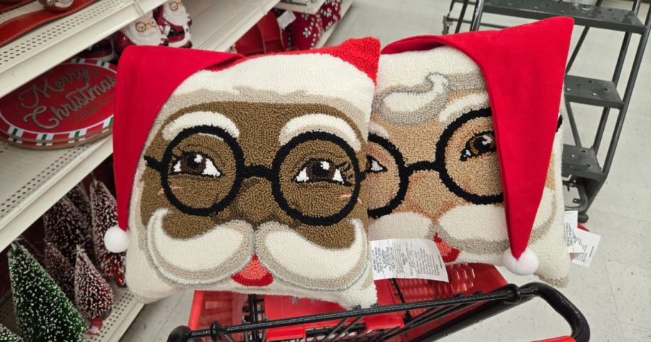 2 Christmas throw pillows of Santa's face