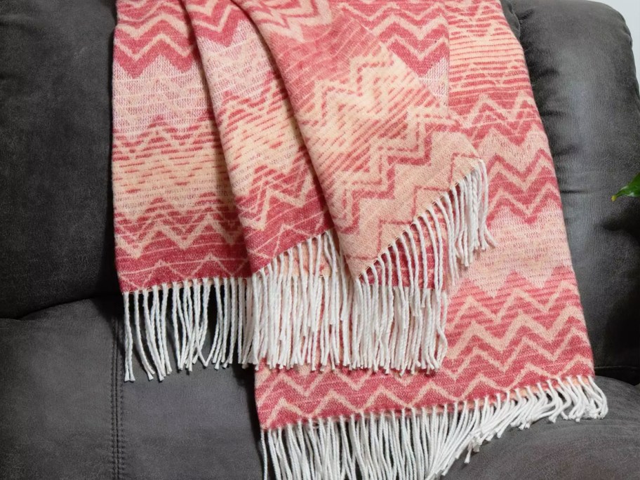 red chevron print throw draped over a couch