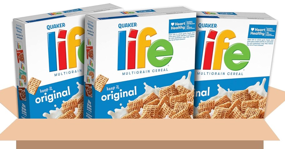 3 boxes of quaker life cereal in a cardboard box
