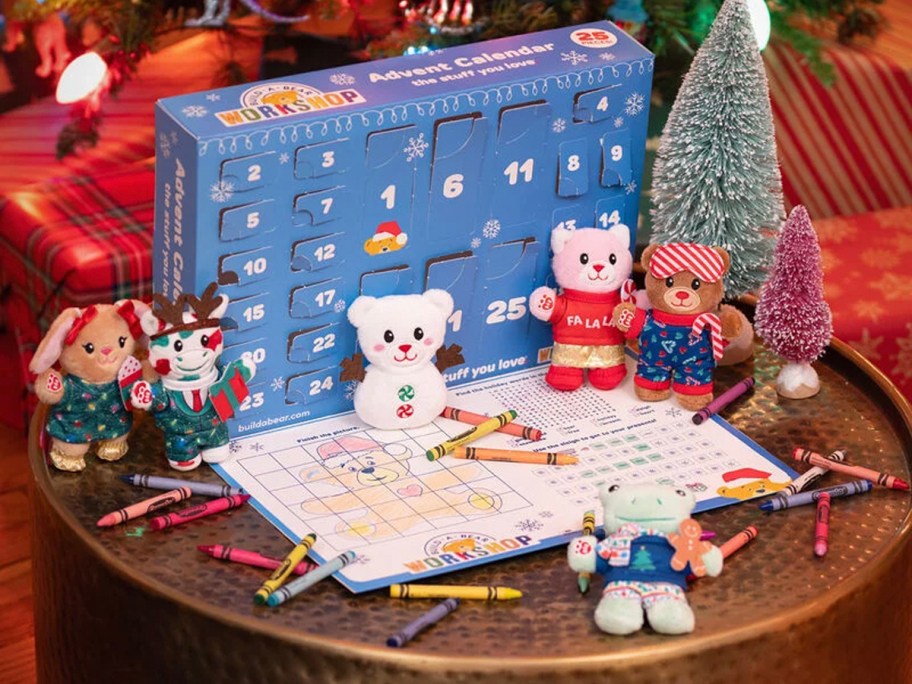 build a bear advent calendar open with plush and crayons on table