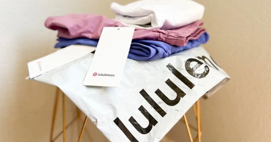 lululemon bag with shorts and tees on top