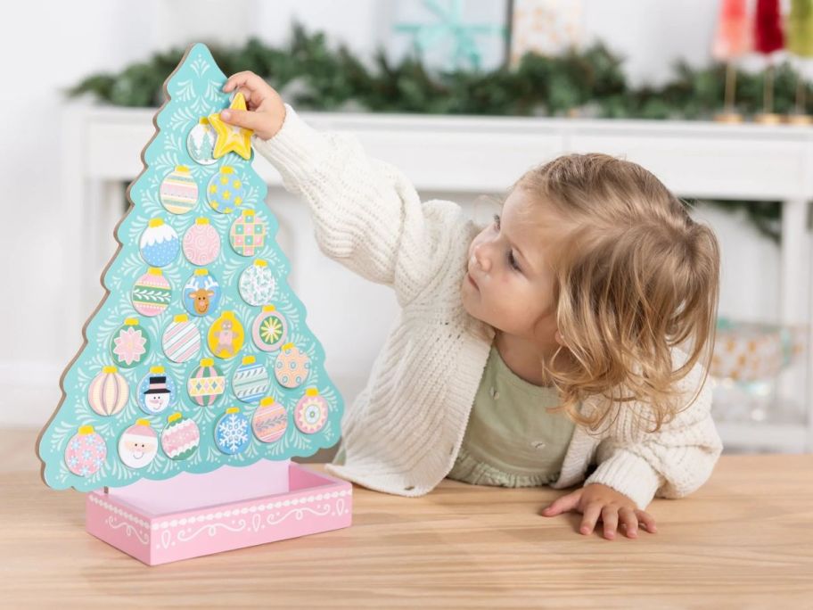kid using melissa and doug advent calendar