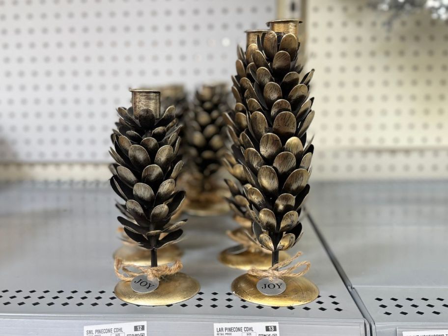 Pinecone Candleholders on shelf in store