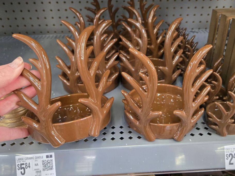 Large Ceramic Candle Holders on shelf in store
