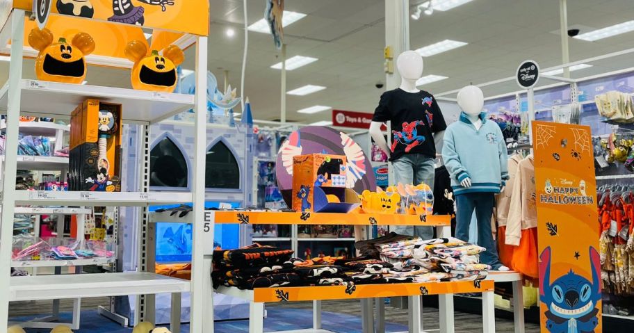 A Target store display filled with Disney Halloween merchandise 