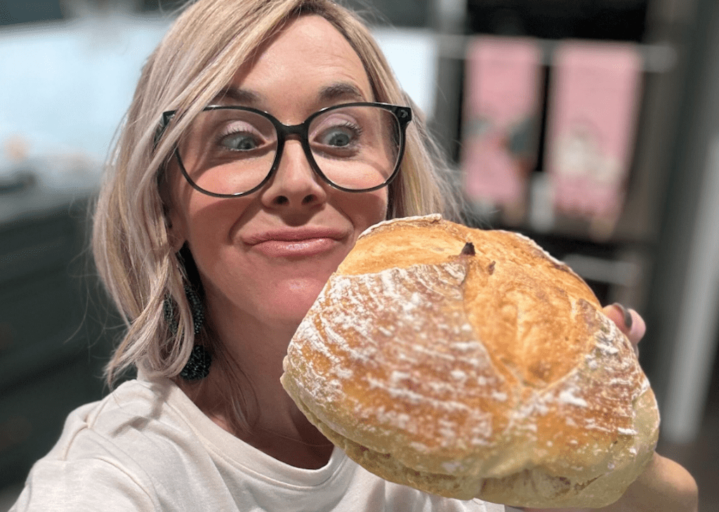 Collin holding sourdough bread 