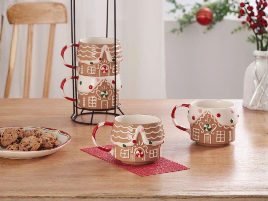 gingerbread house mugs on table