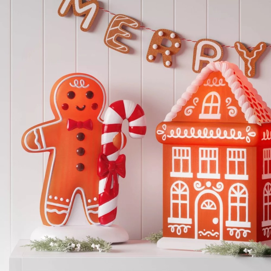 a blow mold Gingerbread man and Gingerbread house