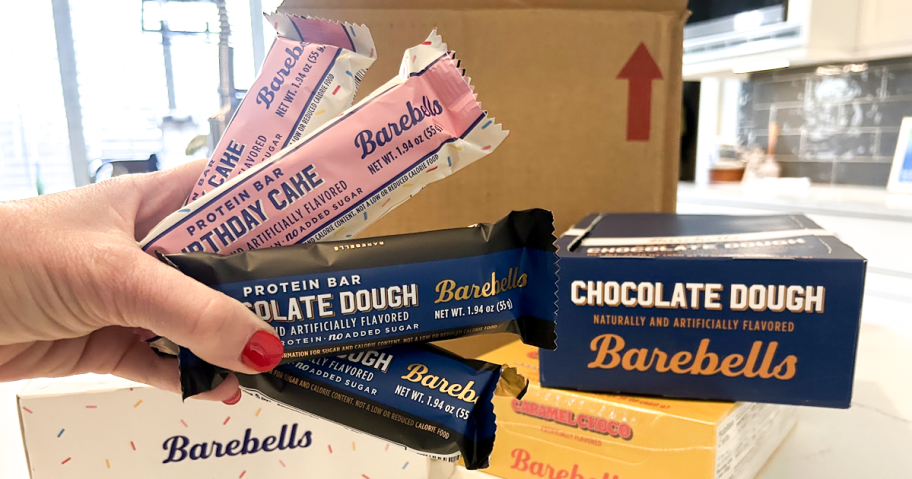 Barebells Protein Bars in hand