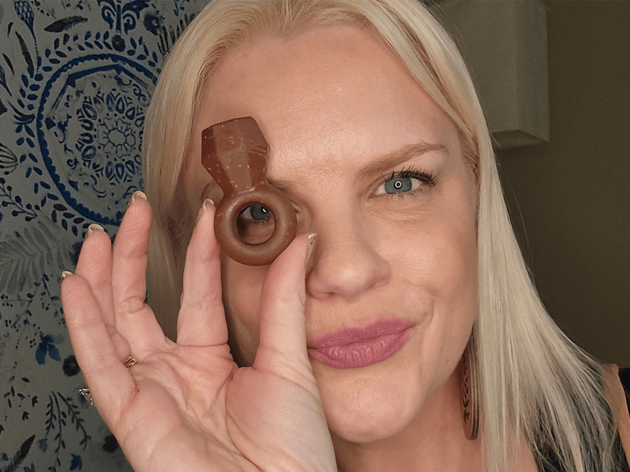 Ring Pop being held by a woman