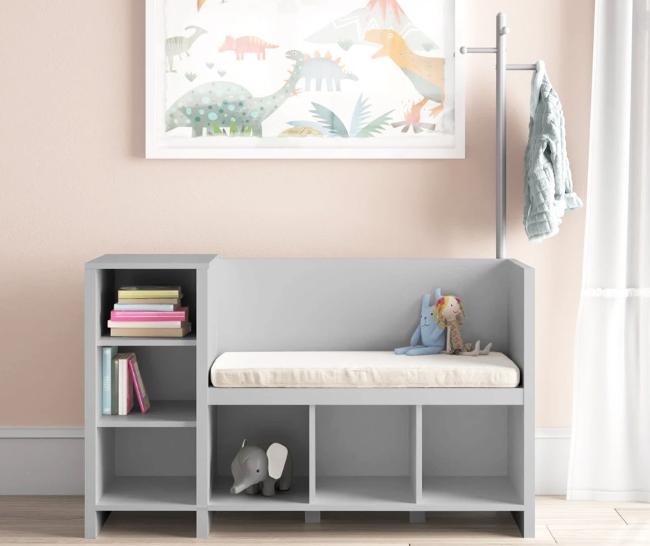 grey storage bench with coat rack in kids room